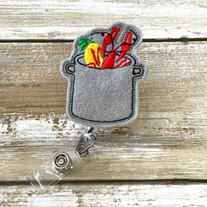 Crawfish Boil Badge Reel