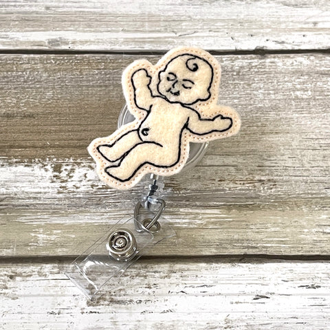 King Cake Baby Badge Reel