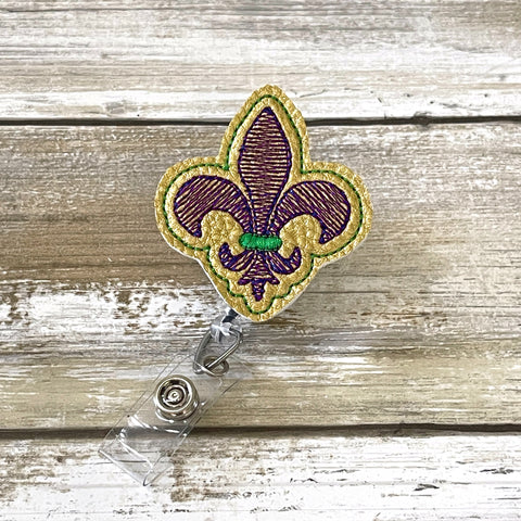 Mardi Gras Fleur De Lis Badge Reel