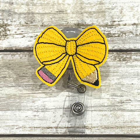 Pencil Bow Badge Reel